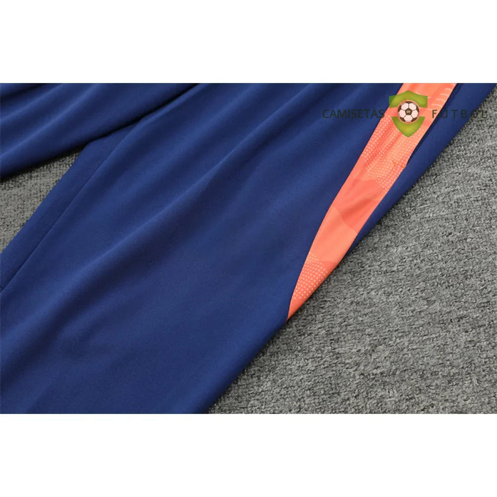Chandal Manchester United 24-25, media cremallera, Modelo 1